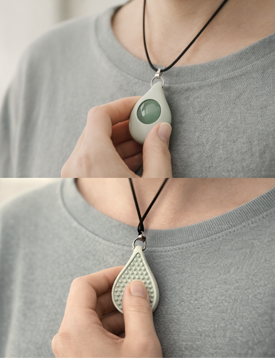 NeuroNecklace pendant — front and back on model